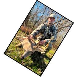 Hunter with prize buck