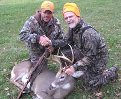 Hunters with buck